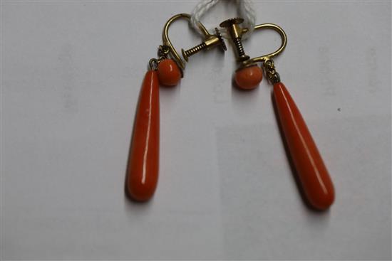 A pair of yellow metal and coral drop earrings and a similar pair of ear clips